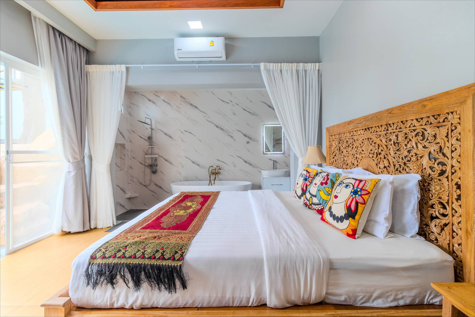 Deluxe bedroom with pool access, blackout curtains, and premium amenities