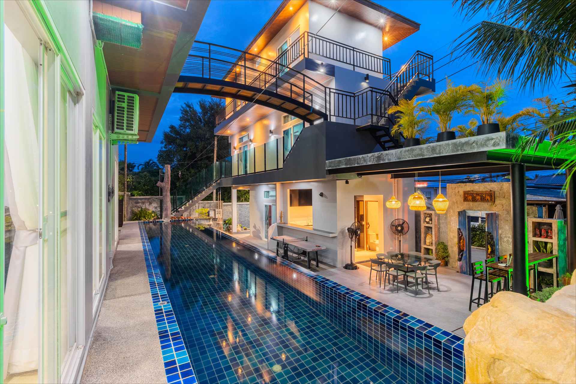 17 metre zipline swimming pool with crystal clear water and sun loungers at the Phuket villa